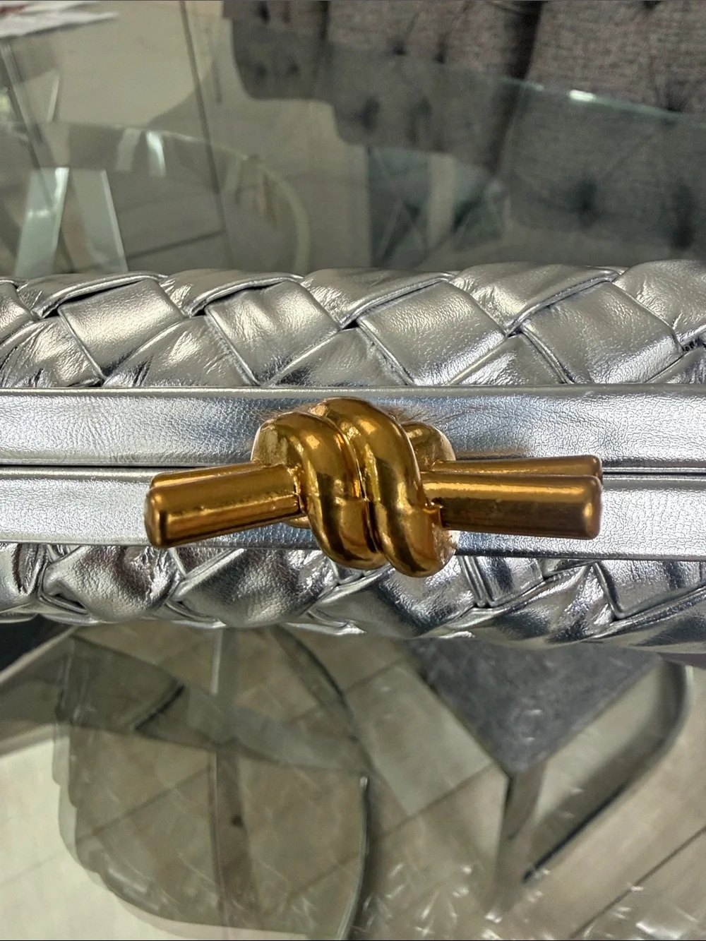 Bottega Veneta Silver Woven Metallic Clutch with Gold Knot Closure -Fake